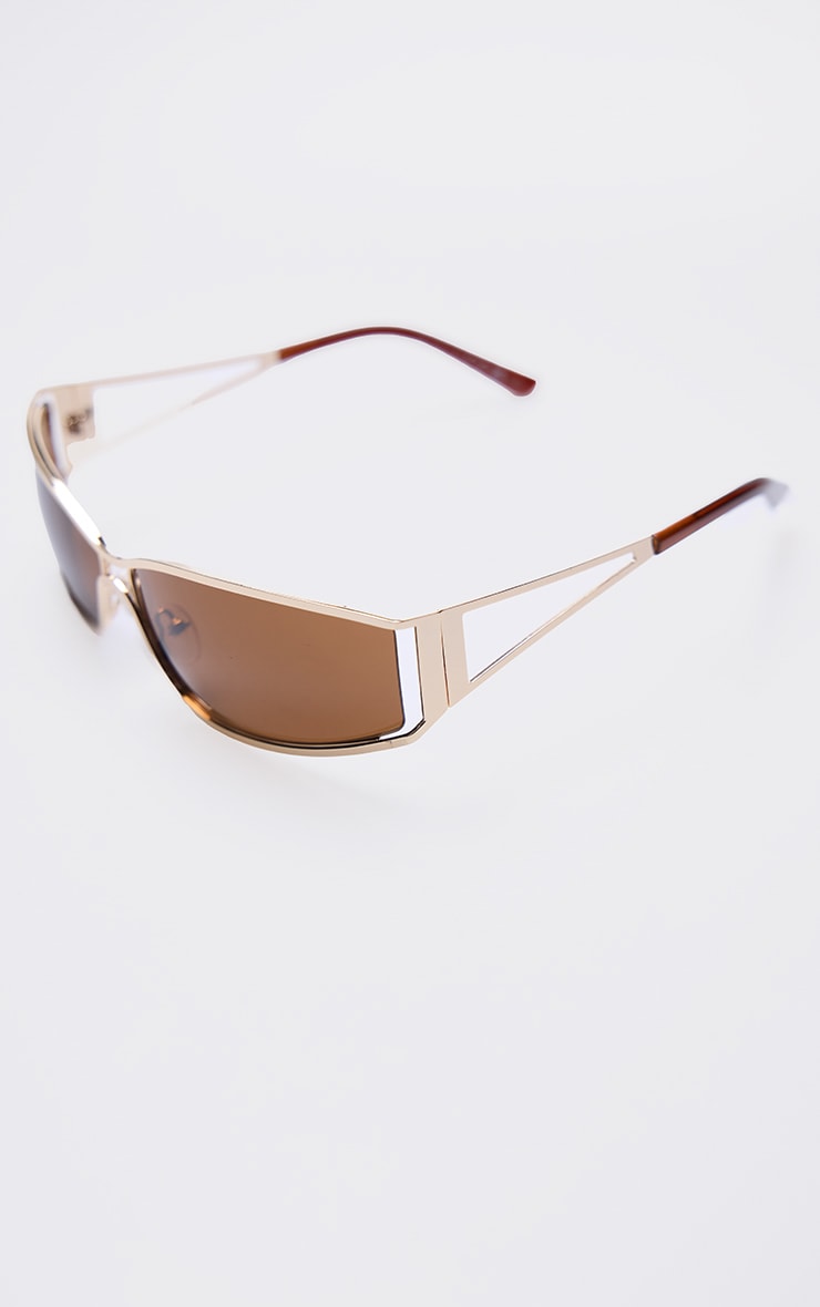 Lunettes de soleil à monture dorée style visière image 3