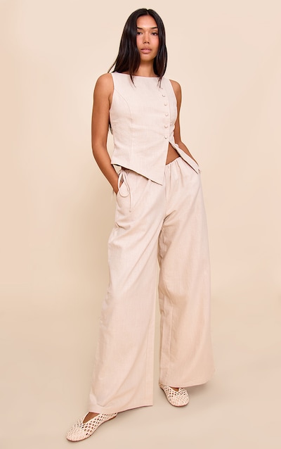 Pantalon large en effet lin deluxe non coloré noué sur les côtés