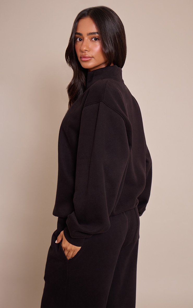 Petite Sweat noir à col entonnoir et zip image 2
