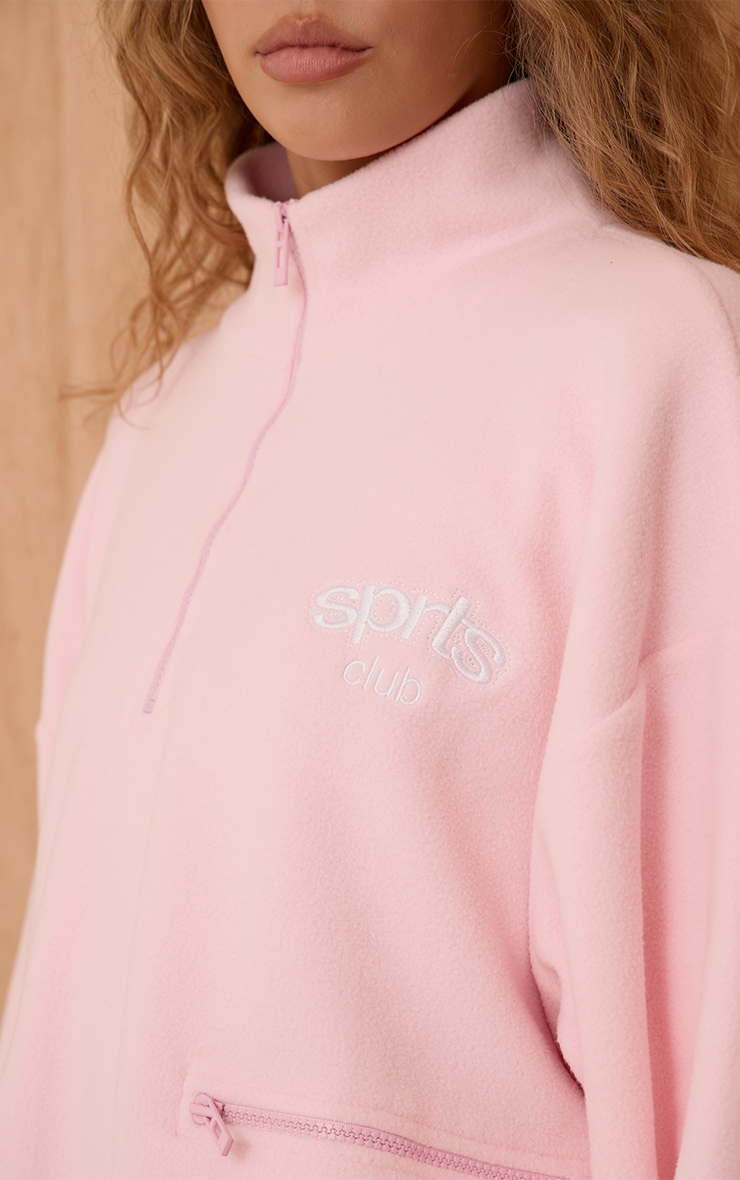 Polaire rose tendre détail poches à quart de zip et "Sports Club" brodé image 4