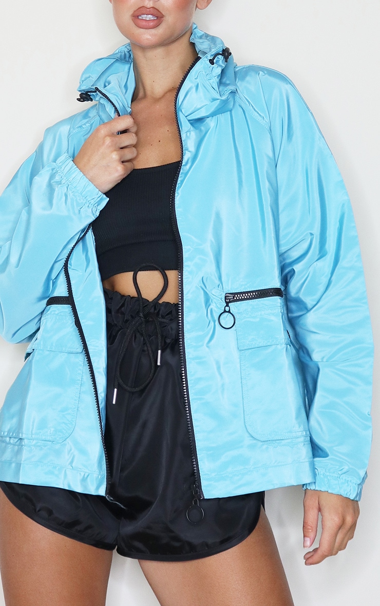 turquoise tracksuit