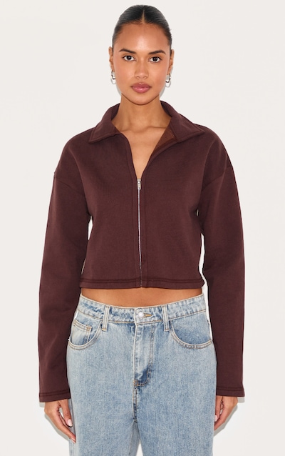 Polo deluxe chocolat à épaules carrées et zip