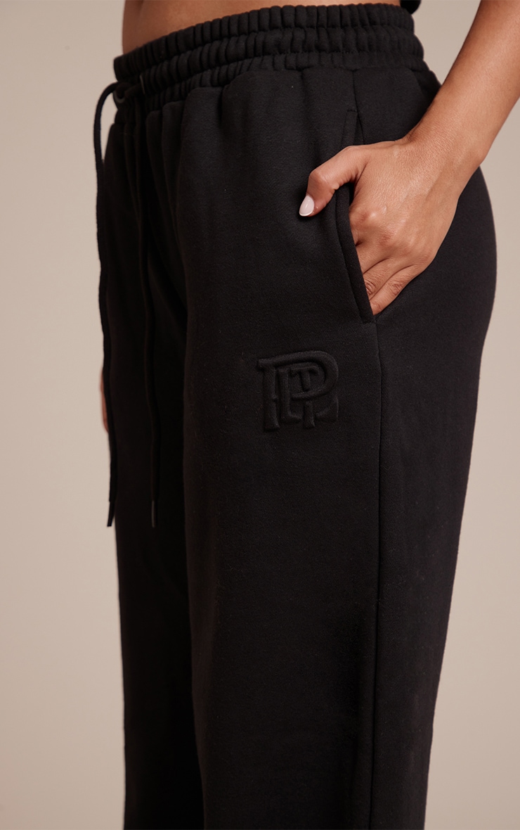 Petite Jogging large noir à cordons ajustables et logo PrettyLittleThing image 4
