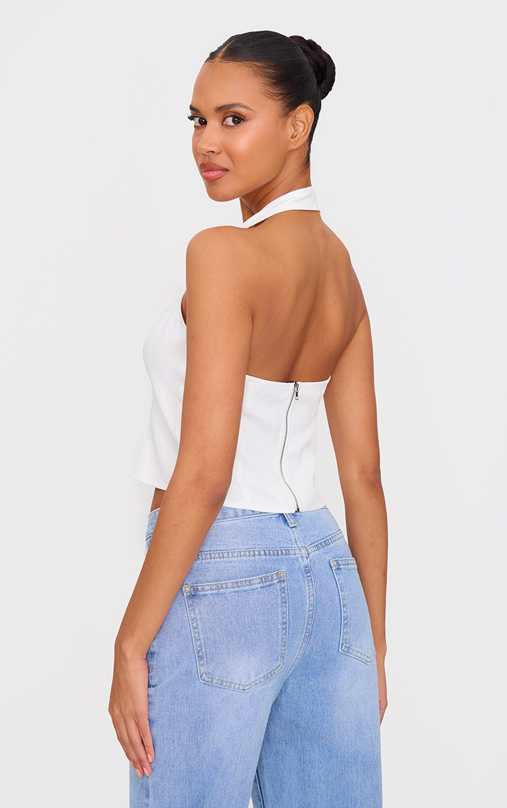 Top long dos nu blanc à décolleté et noeud strassé image 2