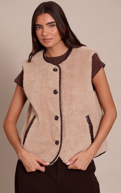 Gilet en imitation mouton beige à brodures en PU