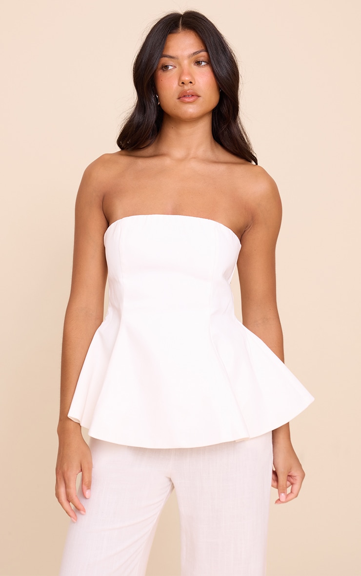Top bustier structuré tissé blanc à ourlet péplum image 1