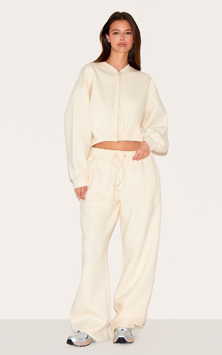 Sweat court crème à cordons ajustables sur la taille et zip image 3