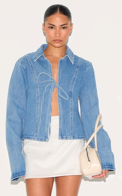 Petite Top en jean bleu moyen délavé noué devant