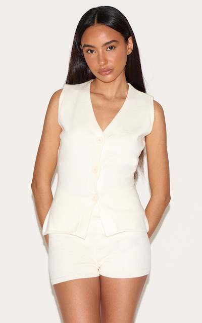 Petite Gilet long en maille tricot crème
