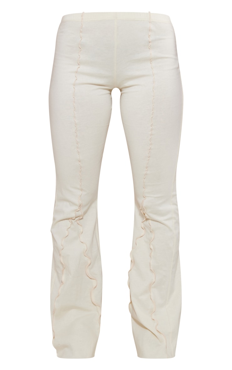 Cream Split Seam Lettuce Hem Flare Pants PrettyLittleThing USA