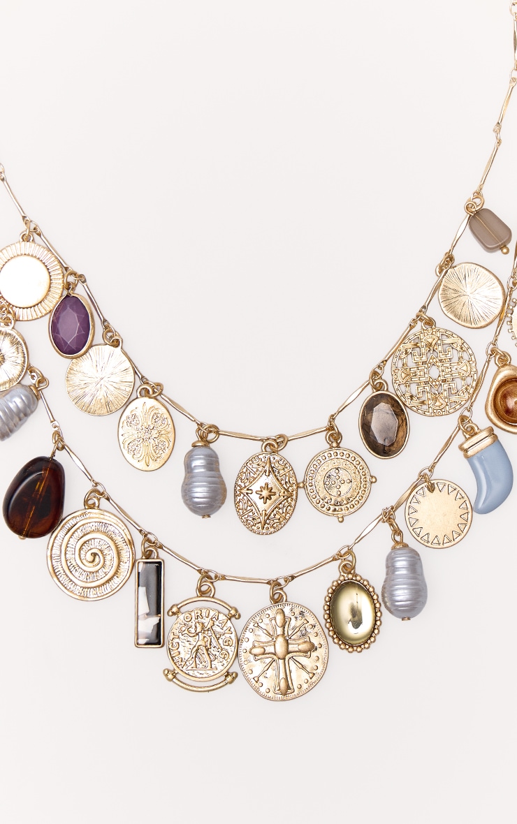 Collier doré à multiples pendentifs breloques image 3