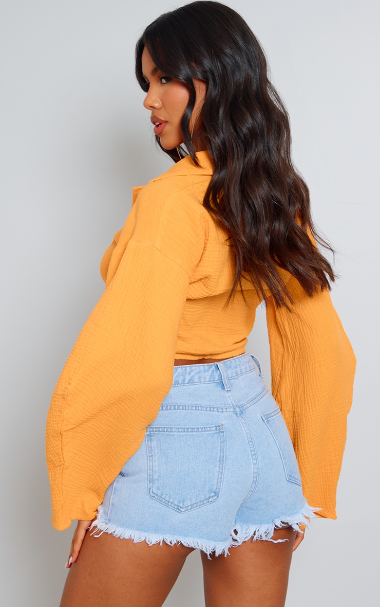 Chemisier oversize orange vif texturé noué devant | PrettyLittleThing FR