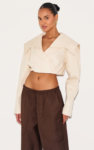 Veste courte asymétrique sable à coupe croisée