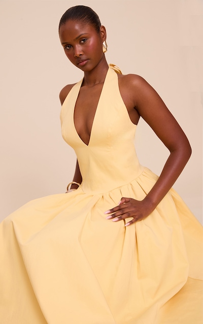Robe longue jaune citron froncée à dos nu et détail noué