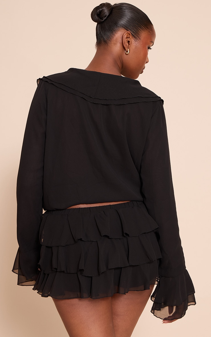 Jupe-short en mousseline de soie noire à volants image 3