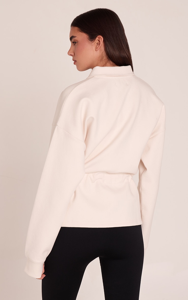 Cream Interlock Peplum Funnel Neck Zip Up Jacket image 2
