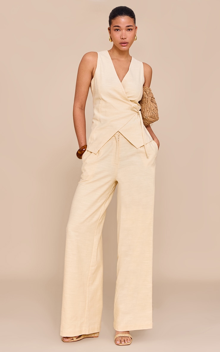 Pantalon large texturé amande plissé à taille mi-haute image 1