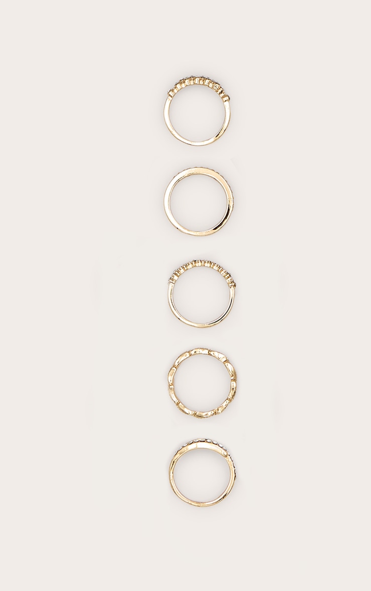 Assortiment de 5 bagues dorées strassées image 2
