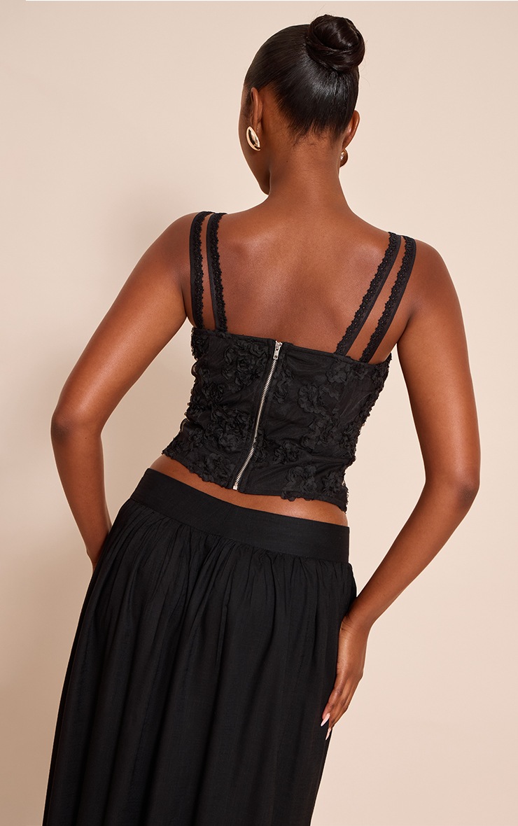 Black corset body with high neck and floral print