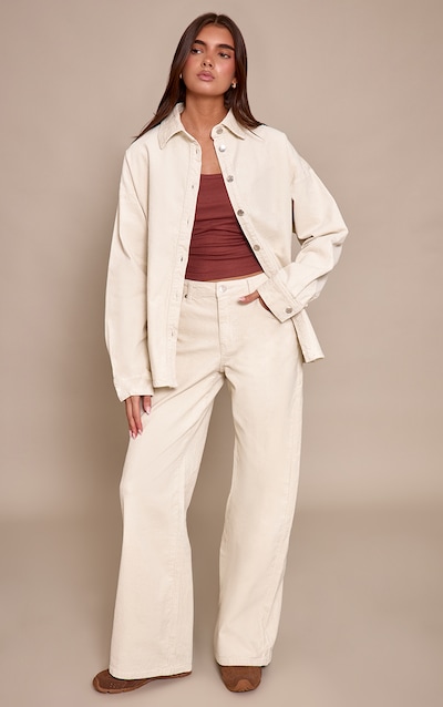 Jean large en velours côtelé écru