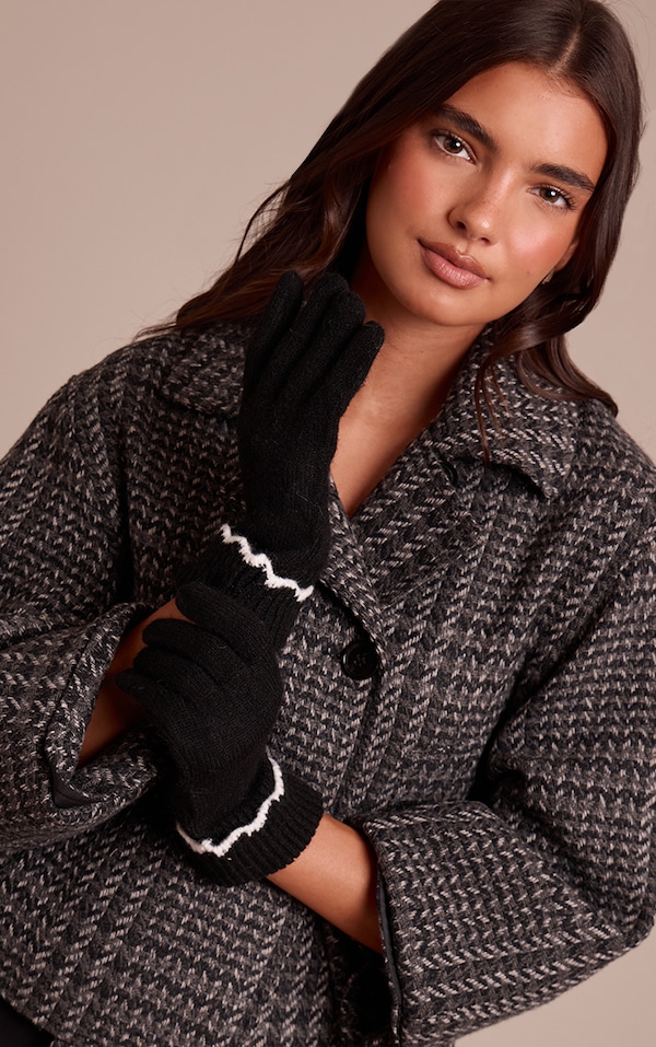 Gants noirs à bordure festonnée blanche