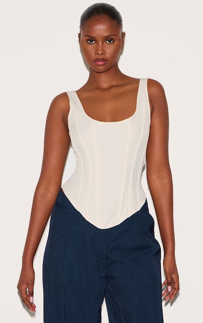 Corset long crème à lisérés structurants et ourlet tombant