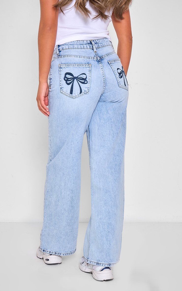 Light Blue Wash Embroidered Bow Pocket Detail Straight Leg Jeans image 3