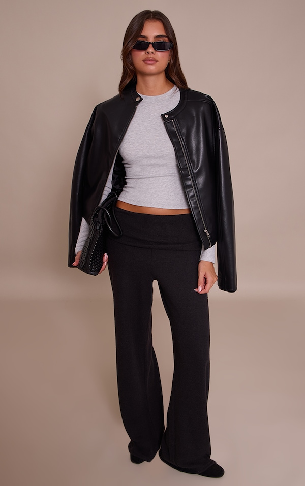 Pantalon droit en effet laine noir à détail replié