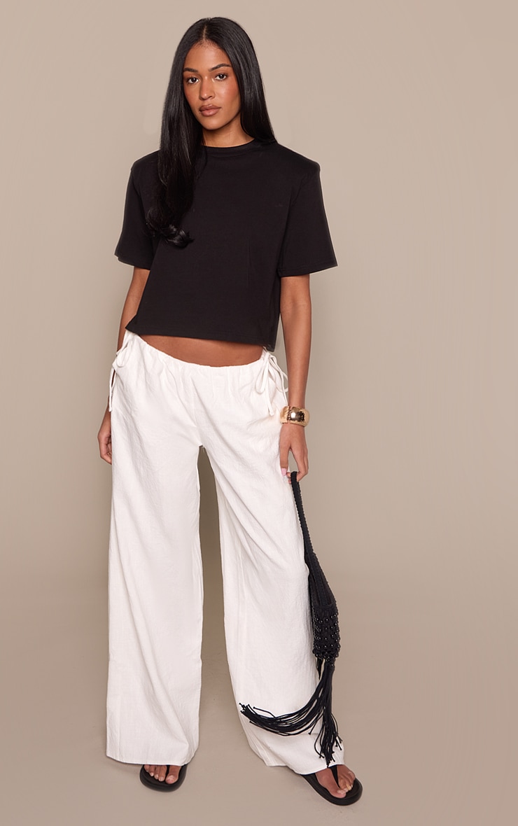 Tall Pantalon large en effet lin deluxe blanc noué sur les côtés