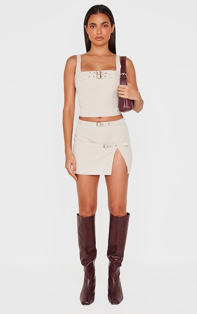 Mini-jupe de tailleur tissée gris pierre à détails ceintures