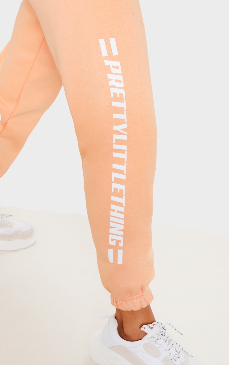 PRETTYLITTLETHING Peach Logo Stripe Joggers image 5