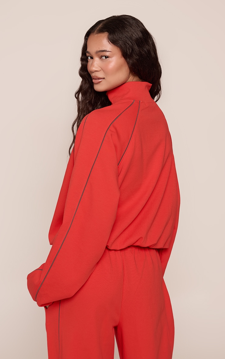 Sweat bomber tissé rouge à lisérés structurants image 2