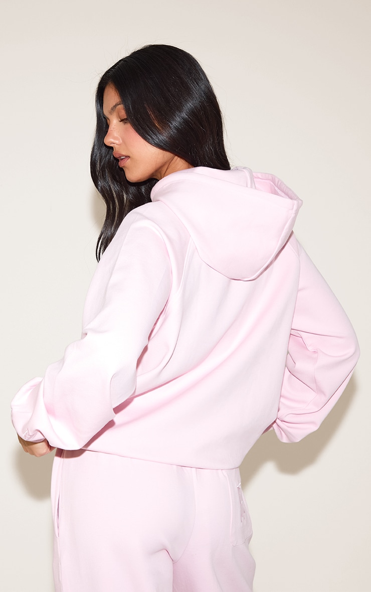 Hoodie tissé rose à logo brodé image 2