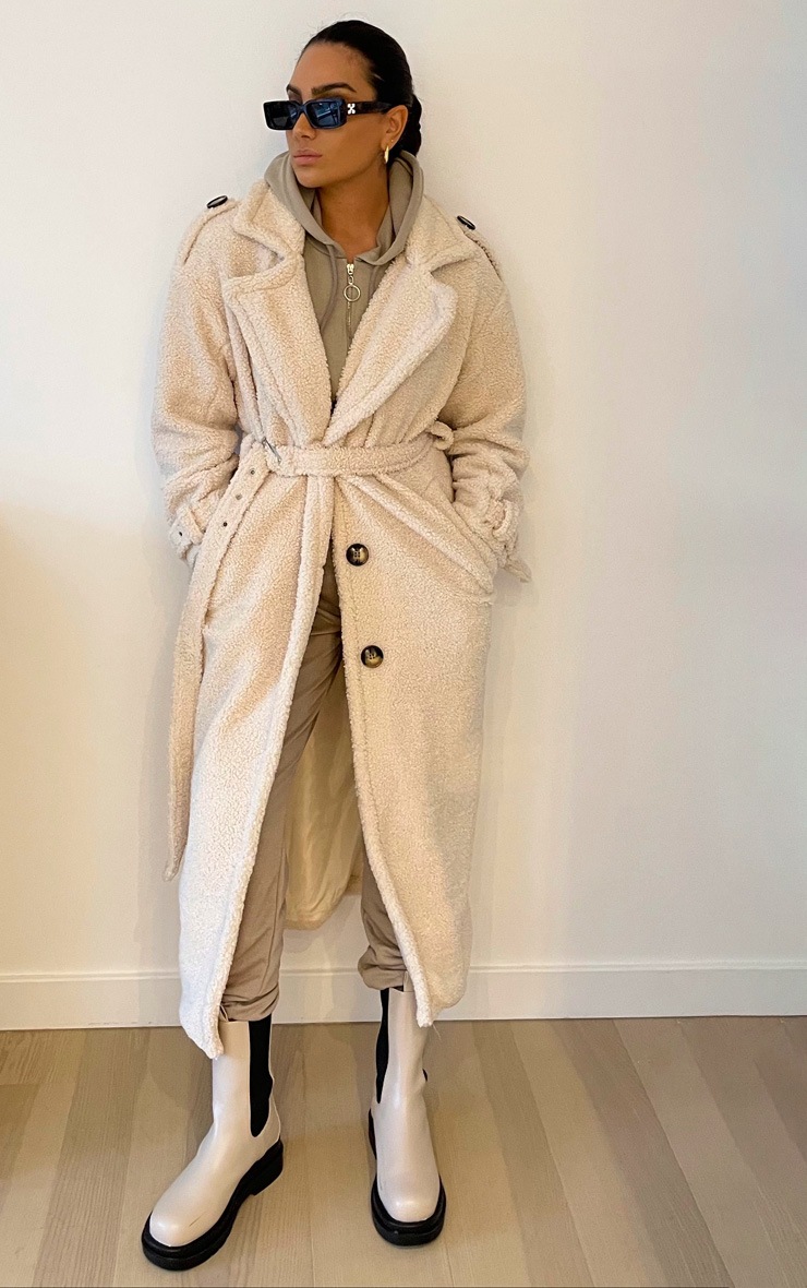 Manteau oversized en faux mouton crème à détail ceinture