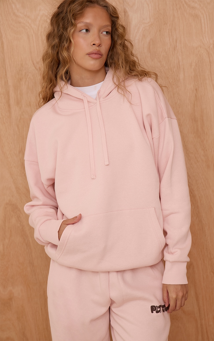 Hoodie oversize rose imprimé "PLT Studio" image 2