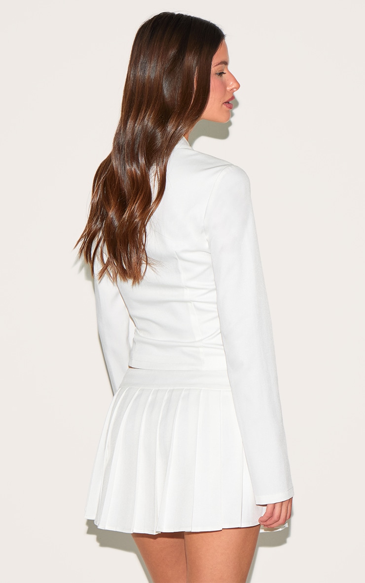 Chemise blanche à boutons et taille cintrée image 2