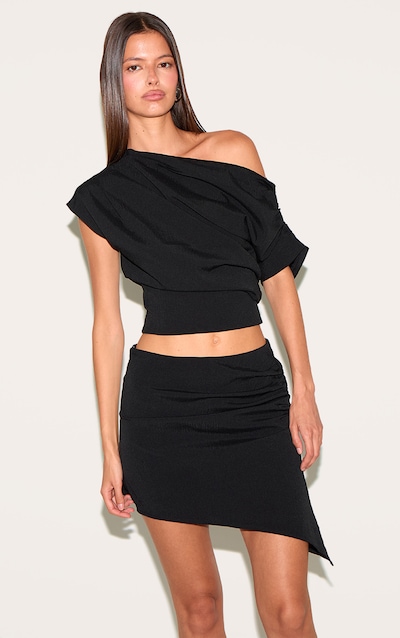 Mini-jupe tissée noire froncée à taille mi-haute