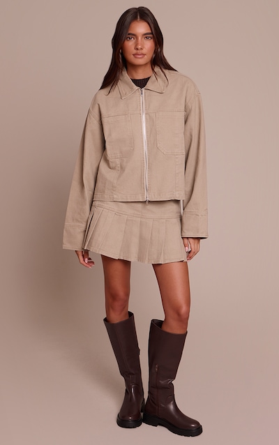 Mini-jupe en jean gris pierre plissée