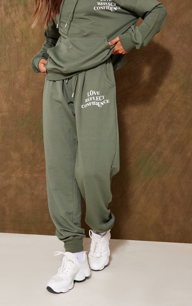 Moss Khaki Love Reflect Confidence Slogan Print Oversized Track Pants image 2