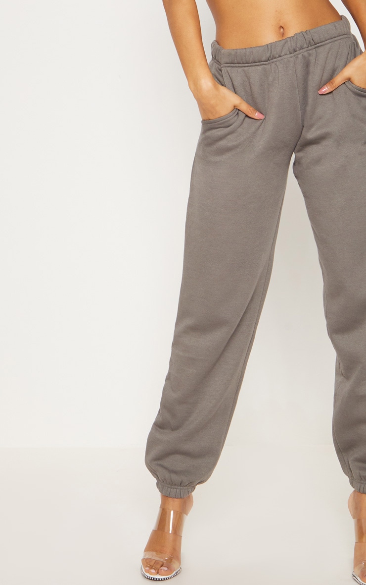 swoosh grey joggers