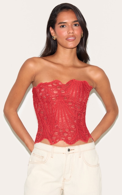 Corset en dentelle texturée rouille transparente fleurie