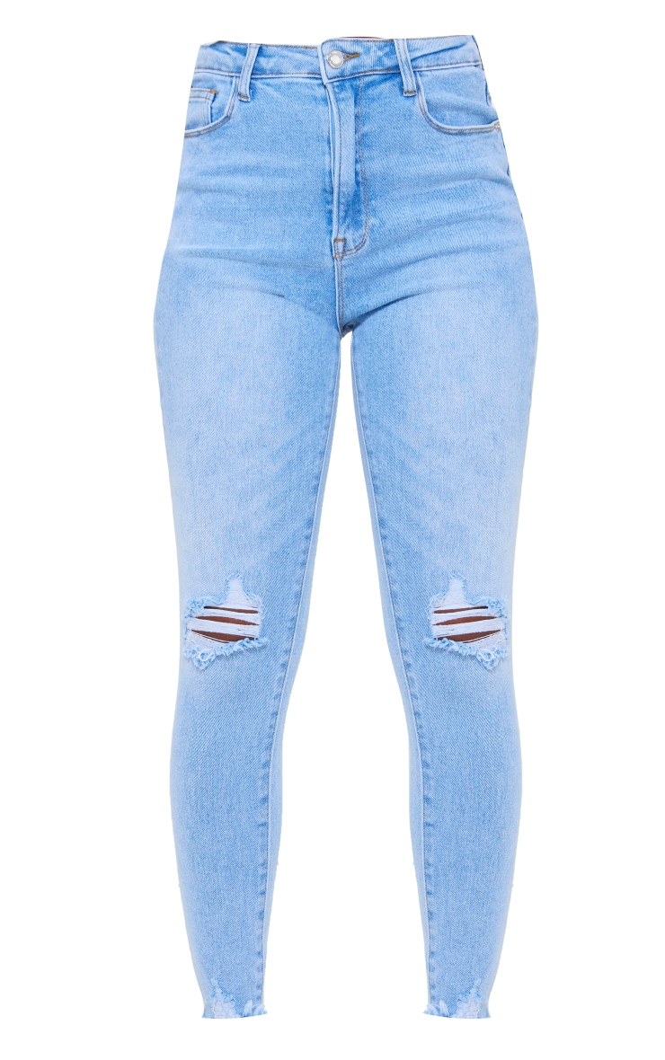 Light blue sale distressed skinny jeans