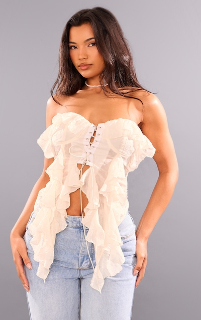 Corset bustier en mousseline de soie crème à lacets et volants