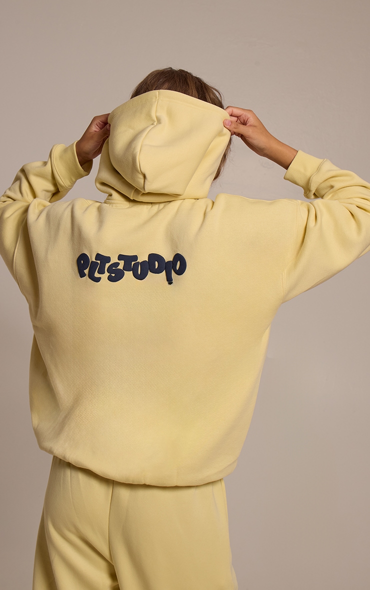 Hoodie oversize jaune imprimé boule PLT Studio image 2