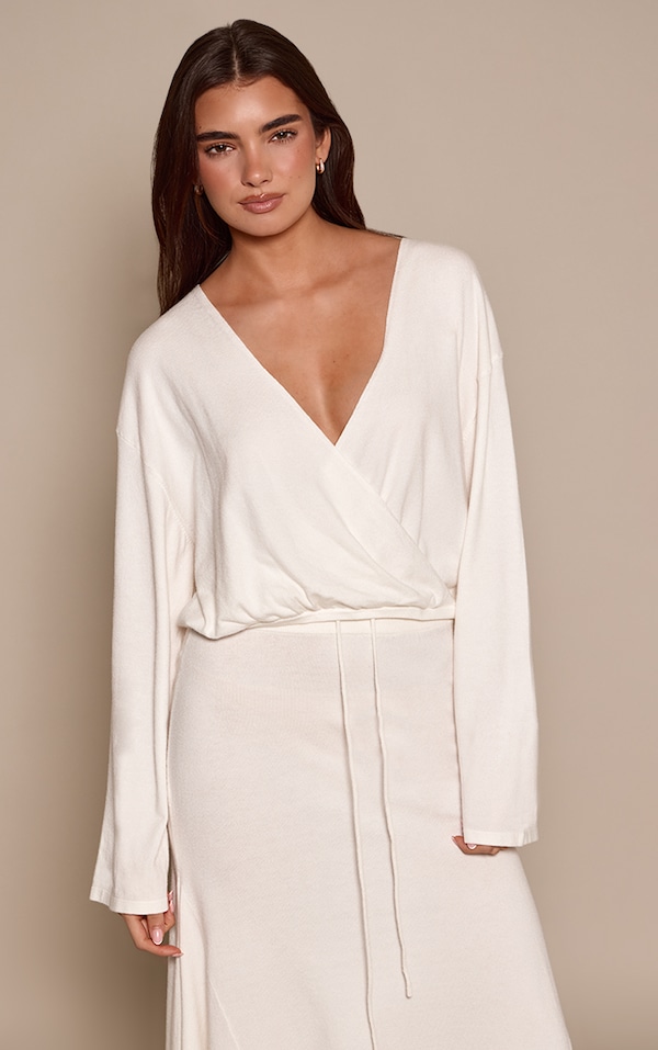 Cardigan cach-coeur fluide en maille tricot crème transparente