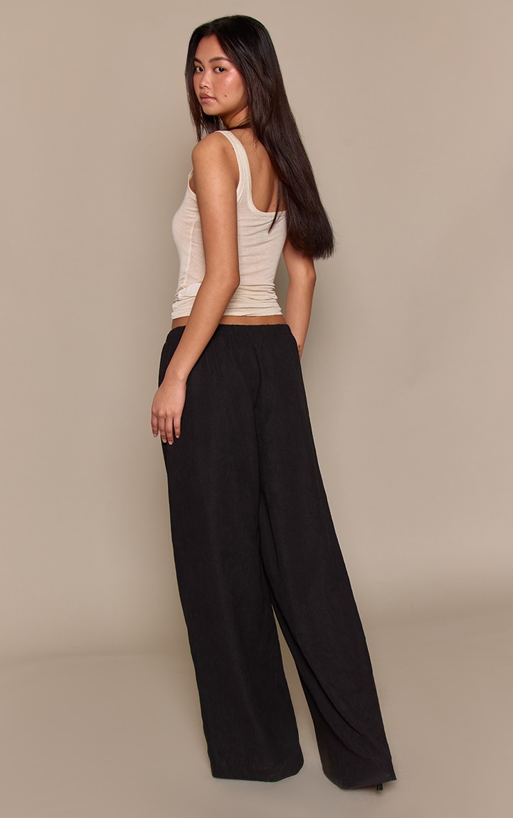 Pantalon large en peau de pêche crêpée noire image 3