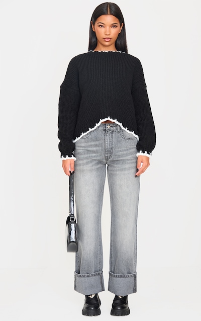 Pull oversize style couverture en maille tricot noire et blanche à coutures contrastantes