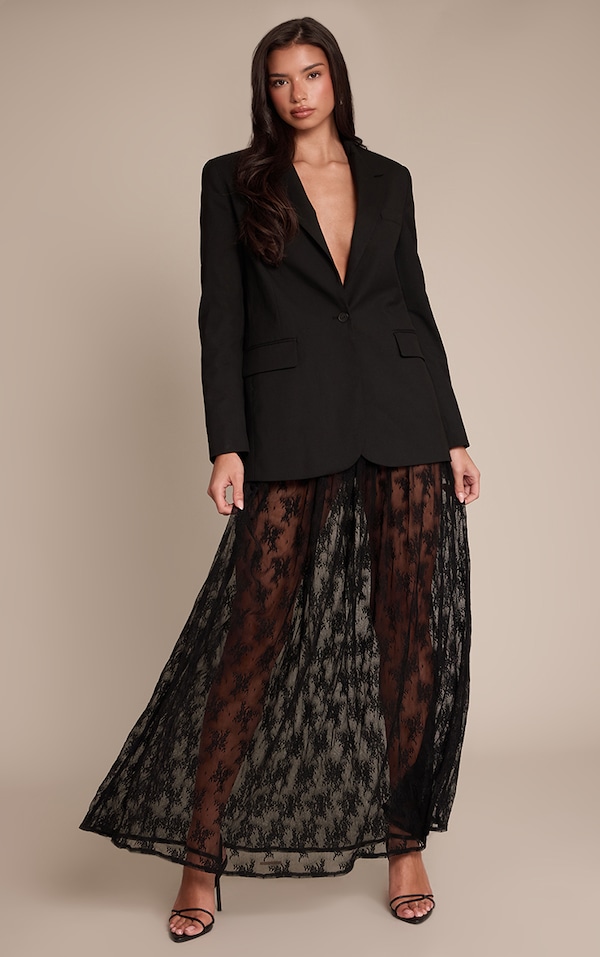 Jupe longue en dentelle noire transparente