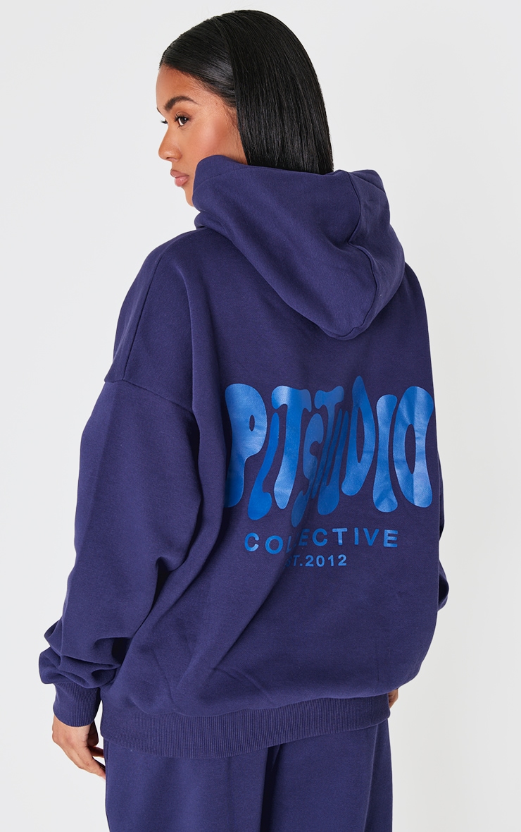 PRETTYLITTLETHING Navy Studio Print Oversized Hoodie image 1