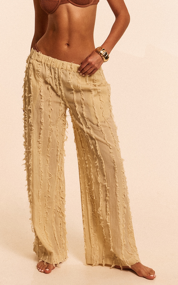 Pantalon en coton gris pierre à lisérés élimés image 2